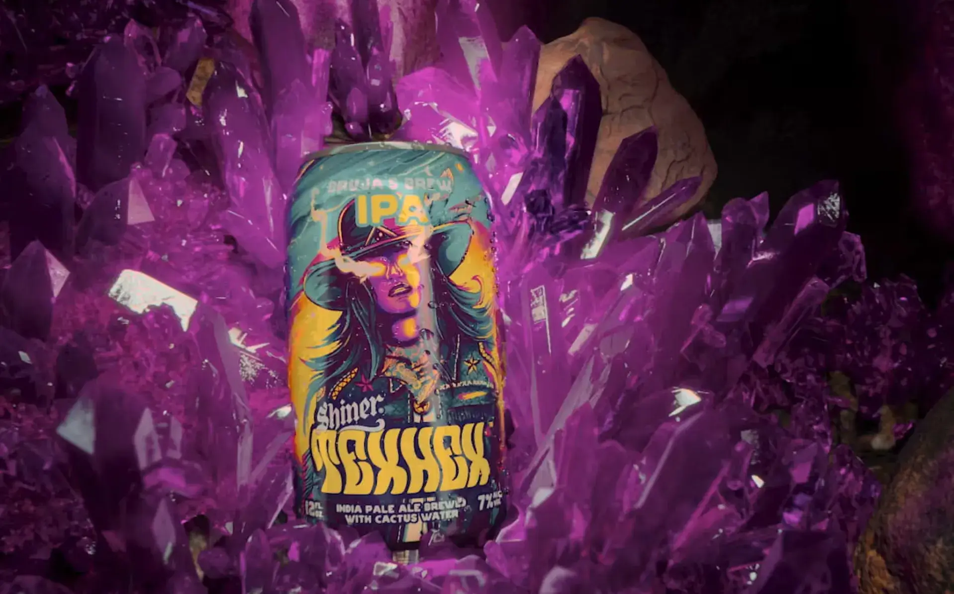 A can of Texhex IPA surrounded by purple crystals.